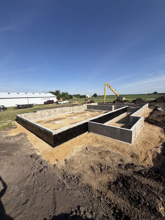 Foundation walls and interior footings formed and poured