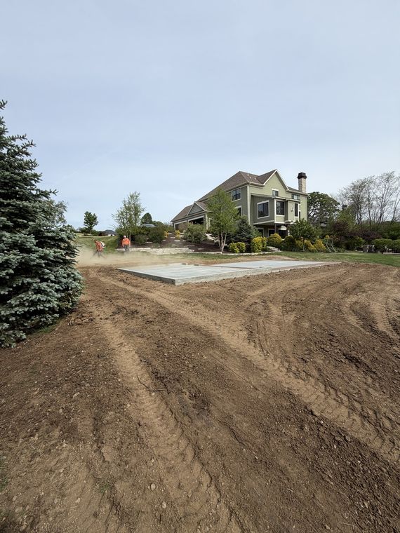 Finished concrete slab with a graded approach leading up to it